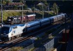 Northward goes Amtrak train 66 passing by the NS research train.